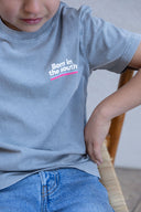 LIGHT GREY BORN IN THE SOUTH PINK KIDS T-SHIRT
